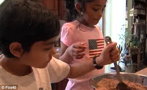 Playtime: Balancing out their impressive academia the siblings also both play piano and Tanishq sings in the Sacramento Boys Chorus