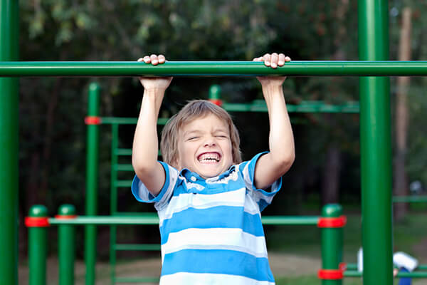 Boy playing sports outdoors Boy playing sports outdoors